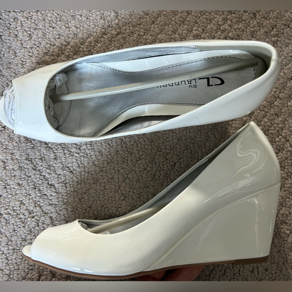White patent wedge pumps by Chinese Laundry